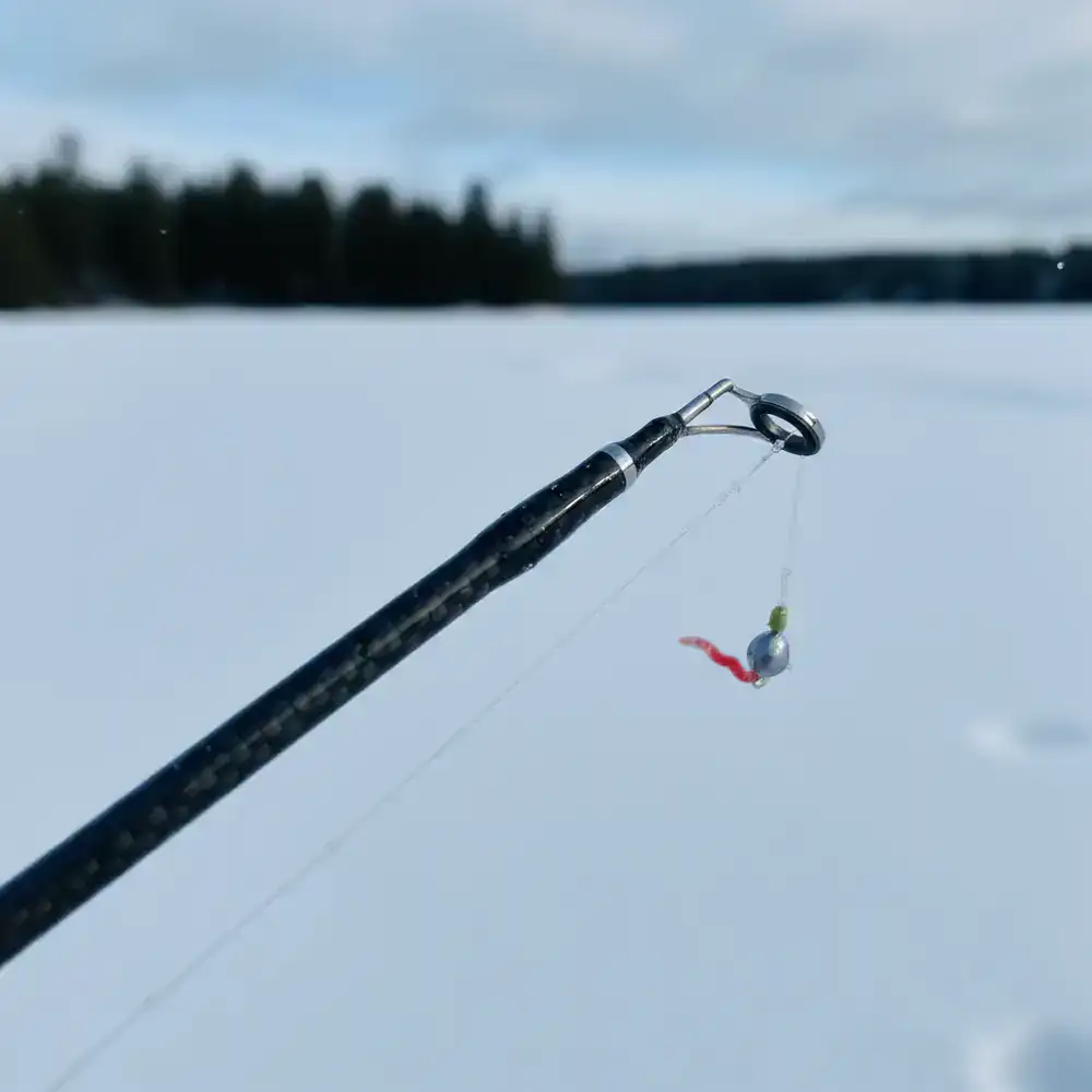 Close-up of a carbon fiber ice fishing rod tip